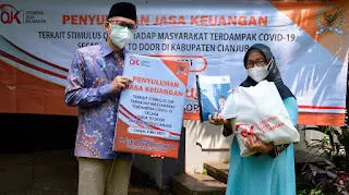 H. Ecky bersama OJK dan Yayasan Ishlahul Ummah Berikan Penyuluhan Stimulus